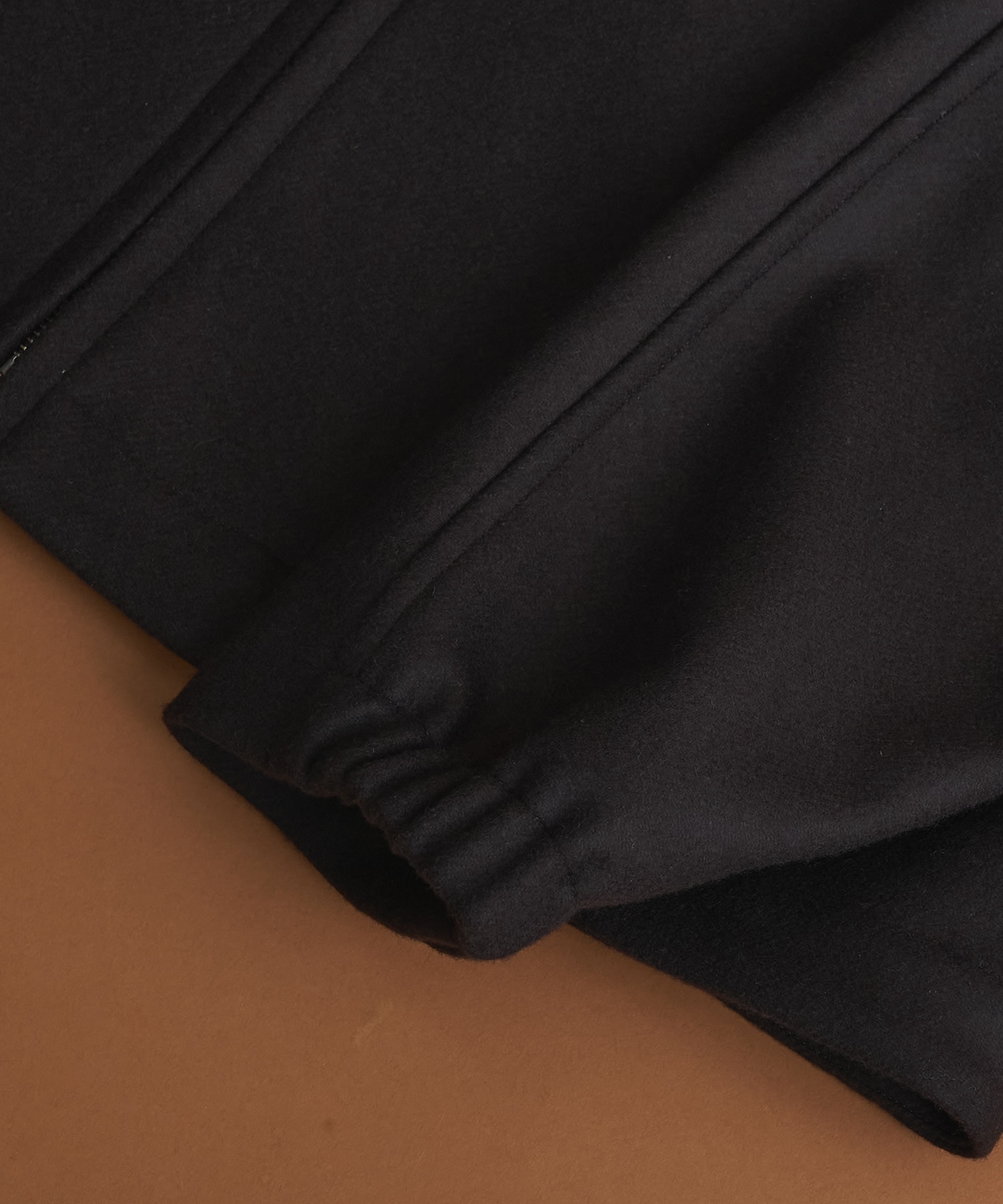 Super140sメルトンスタンドジップBL