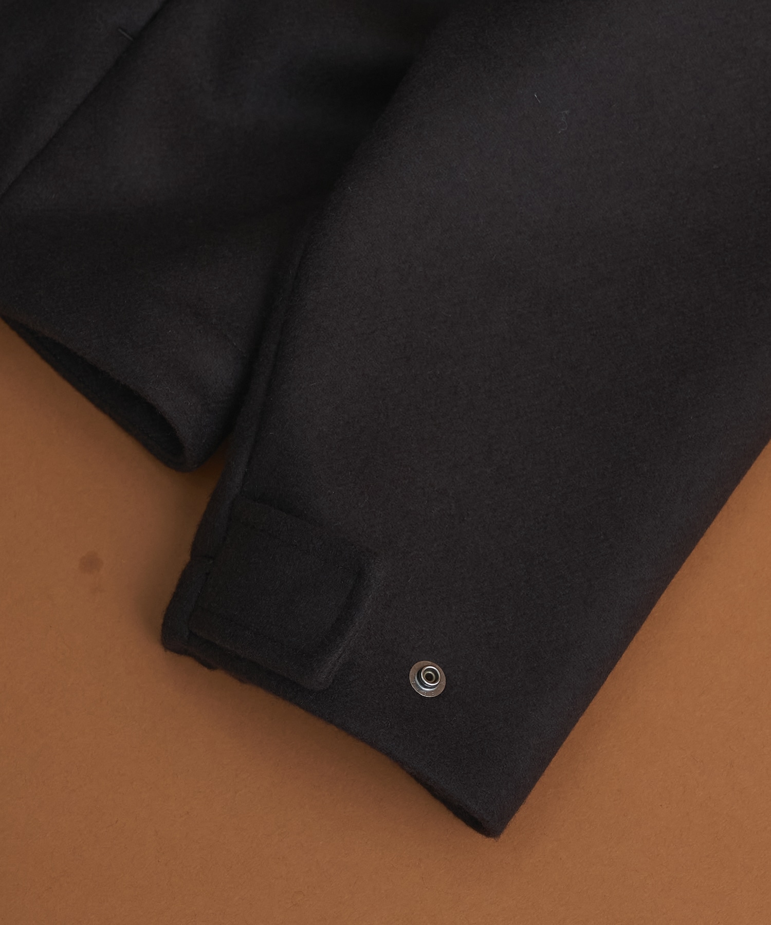 Super140sメルトンスタンドジップBL