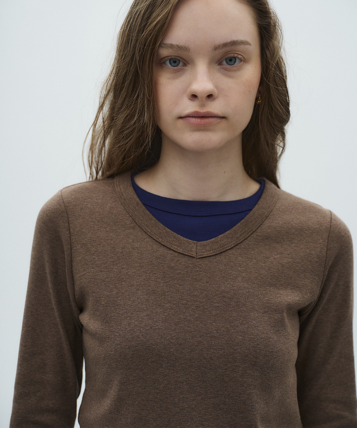 Vネックレイヤードトップス