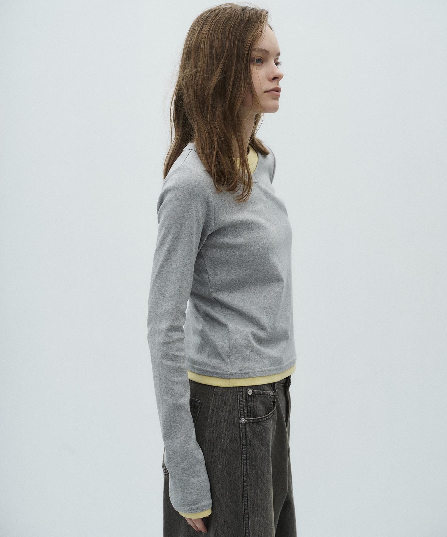 Vネックレイヤードトップス